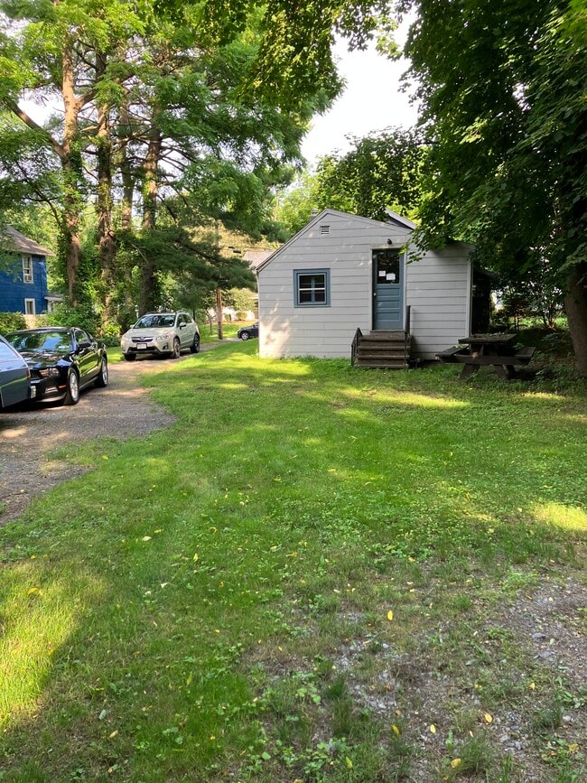 Read view of house with backyard view - 15 Washington Rd