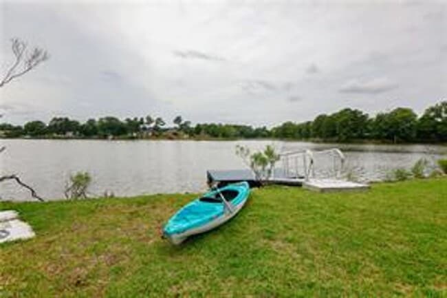 Building Photo - 4 BED/3 BATH LOCATED IN A WATERFRONT COMMU...