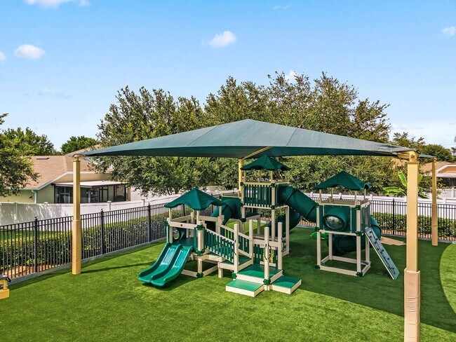 Building Photo - 4/2 in Gated Community near Tuskawilla Rd ~ Tile and Laminate Floors ~ Screened Patio ~  Communit...