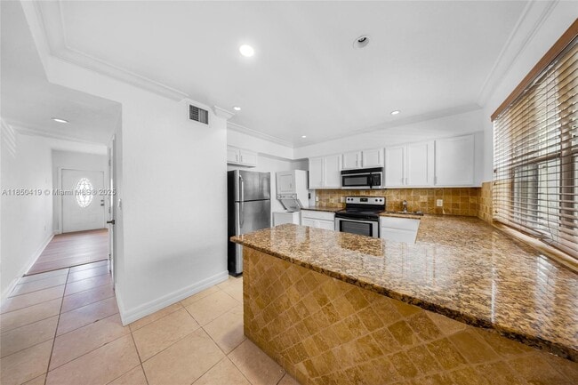 Building Photo - 7801 Hispanola Ave