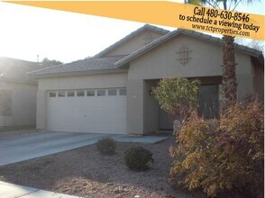 Building Photo - 12827 W Modesto Dr