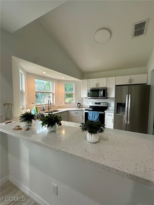 Building Photo - 16821 Sanibel Sunset Ct