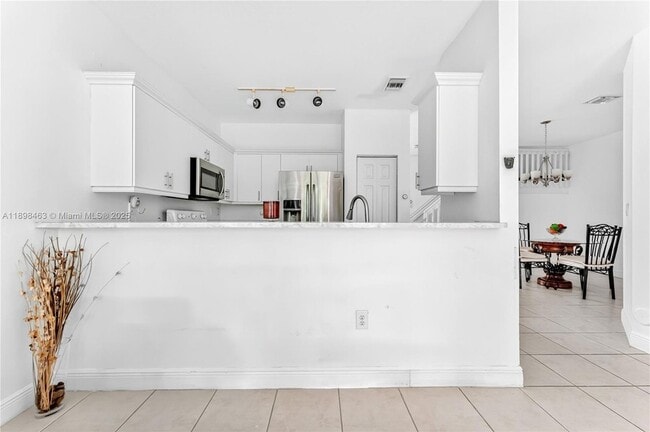 Photo - 10934 SW 247th Ter Townhome