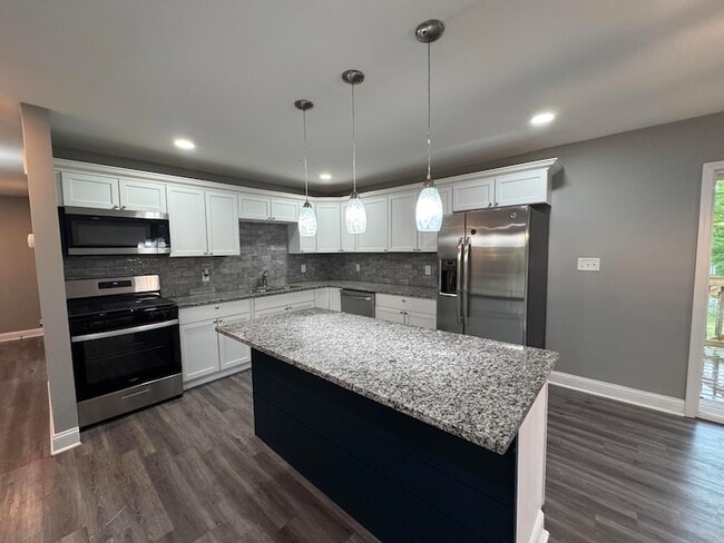 Building Photo - 541 W 67th Ln