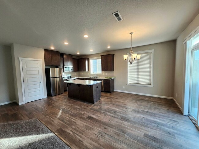 Building Photo - West Richland, where family-friendly living begins!