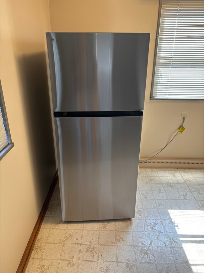 Brand new stainless steel refrigerator - 3957 N 92nd St