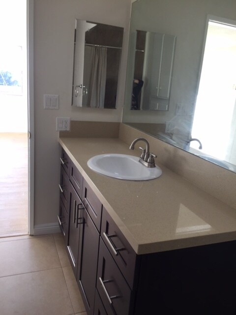 New countertop, sink, cabinet - 1247 N Orange Grove Ave