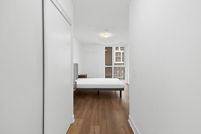 Building Photo - One Plus Den Furnished unit