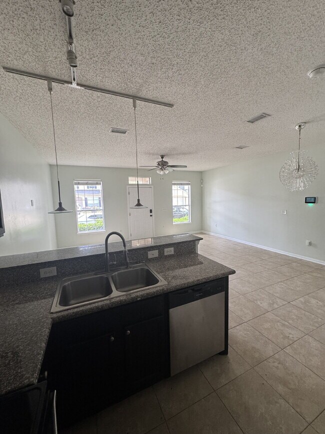Building Photo - Modern 3-Bedroom Townhome with 2 car garage