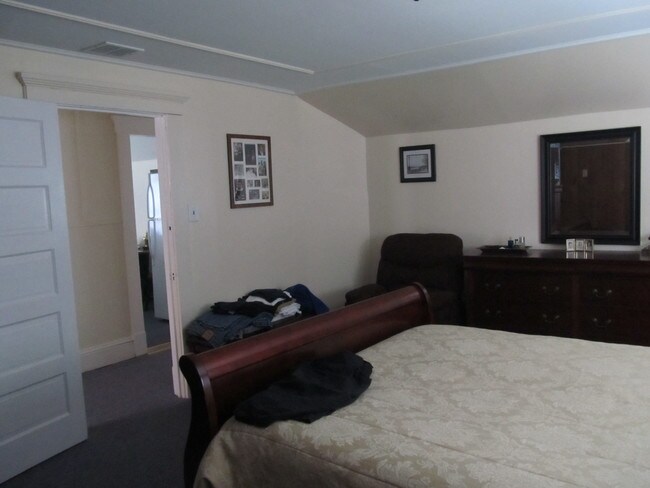 Bedroom 12X16 Example of prior tenant furnishing - 2053 Woodbridge Ave
