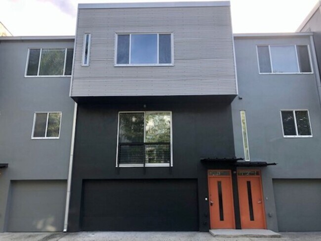 Building Photo - Sleek, Industrial-Modern Townhome in South...