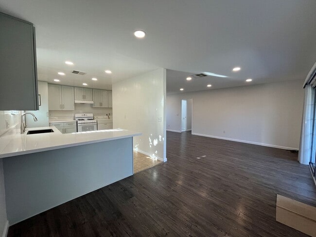 Building Photo - AVAILABLE NOW! Upgraded 3+1.5 w/backyard, ...