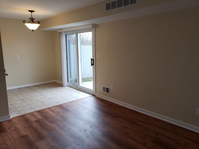 Dining Room and Patio Door - 41207 S Woodbury Green Dr