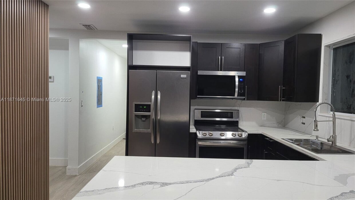 Photo - 2310 Northwest 103rd Street, Miami, FL 33147 - 3 BR 2 BA house