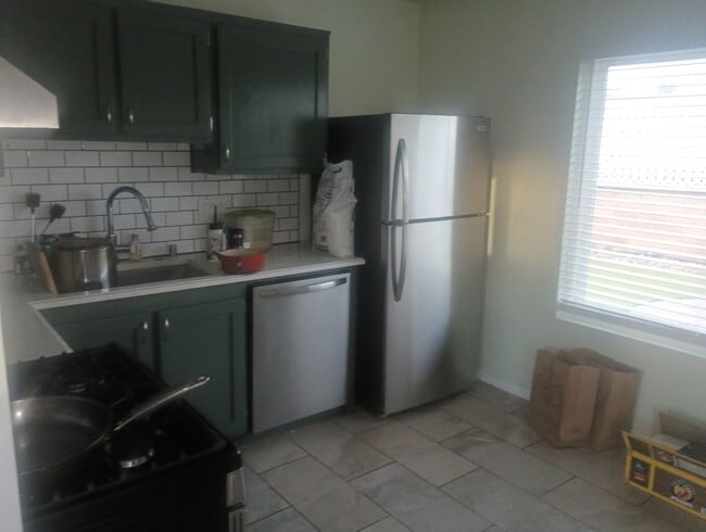 Building Photo - Charming 3-Bedroom, 2-Bath Condo with Private Yard, Solar & Prime 92126 Location