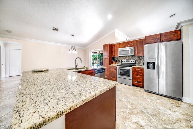 Foto del edificio - 4 br, 2 bath House - 6766 Blue Bay Cir