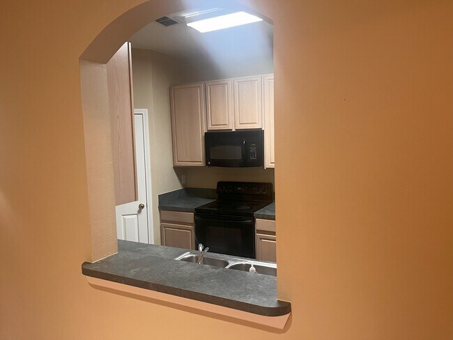 Kitchen from Living Room - 10550 Baymeadows Rd