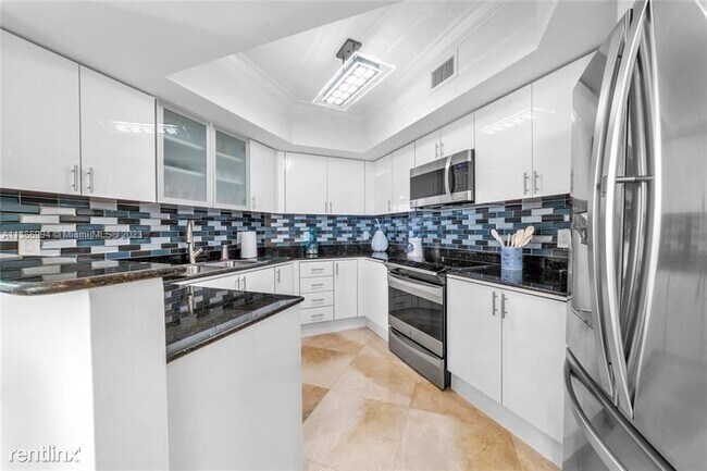 Building Photo - 3 br, 2.5 bath Condo - 16699 Collins Ave A...