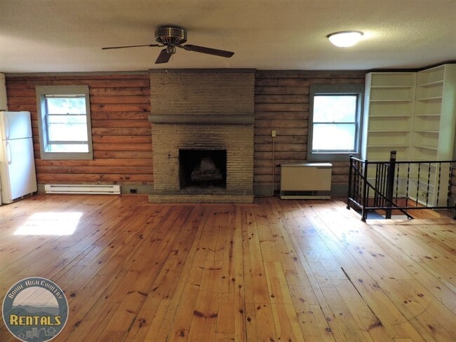 Photo - Cute Log Home Overlooking Wooded Area