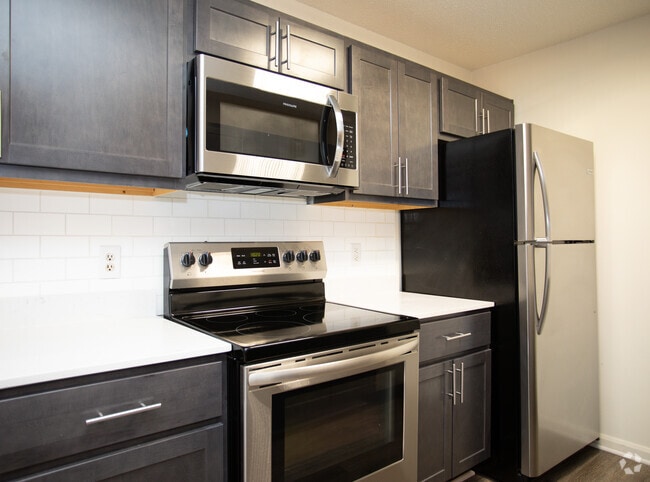 Renovated Kitchens - The Boulders Apartment Homes