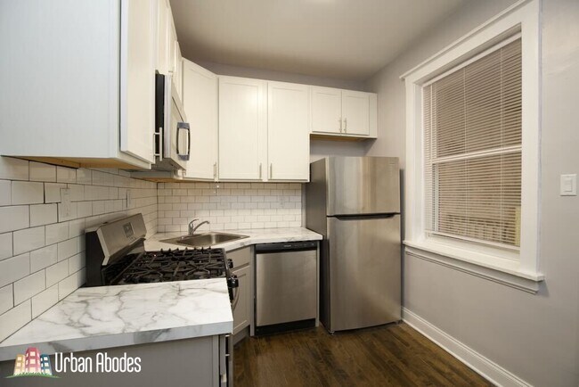 Foto del edificio - 6259 N Lakewood Ave