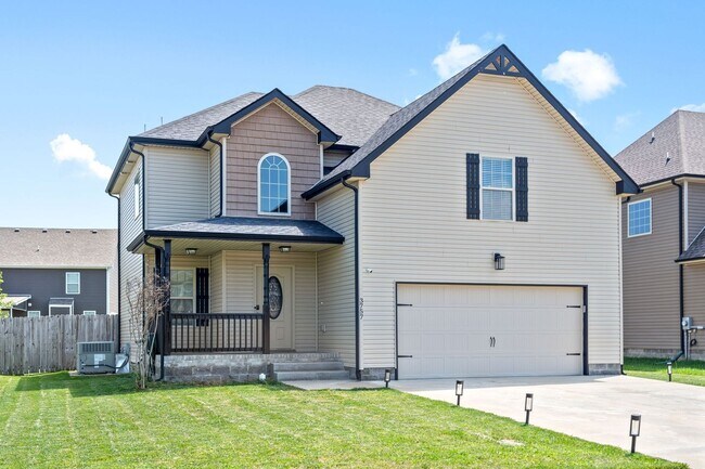 Building Photo - Pet Friendly Three Bedroom with Bonus!