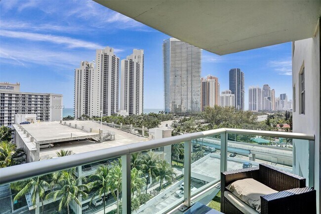 Building Photo - 19370 Collins Ave