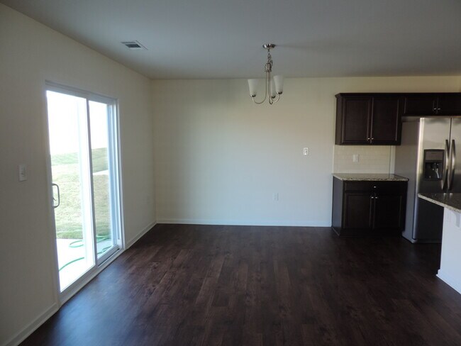 Building Photo - New, 4 bedroom home in the Hallstead commu...