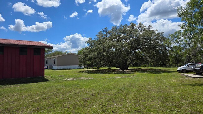 Building Photo - 4BR/3BA home on 3.5 acres of open land wit...