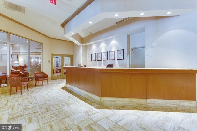 Building Photo - This contemporary, sun-drenched condo is perfect for you!