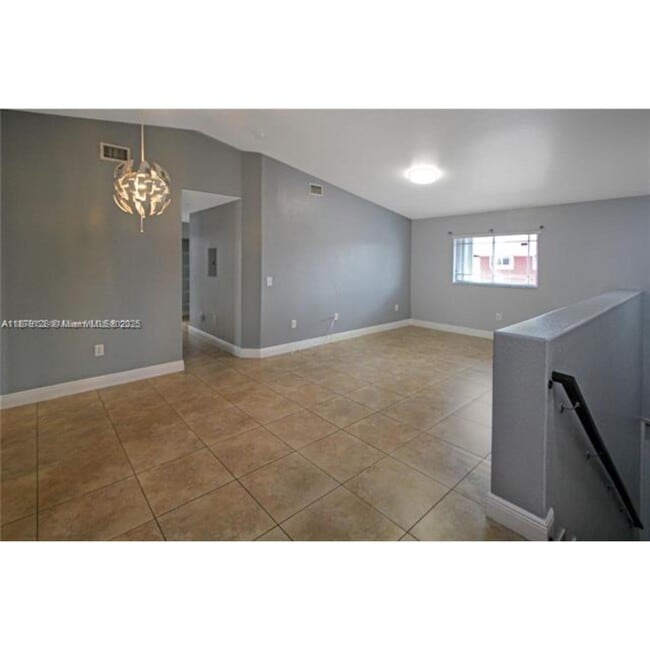 Building Photo - 10953 W Okeechobee Rd