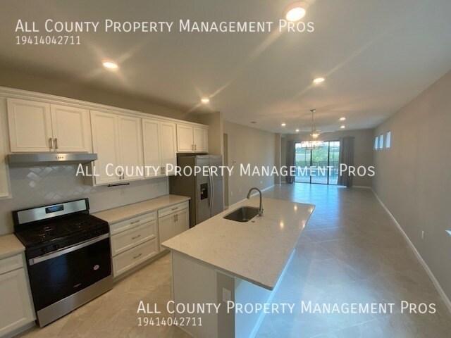 Building Photo - Only 1 year old home!! HEATED POOL!  Maint...