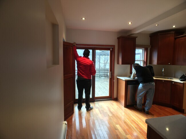 Not shown: small laundry room to left of sliding doors. New washer and dryer included. - 28 W 49th St