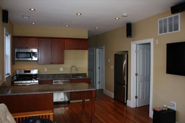 Photo - NO BROKER FEE | Renovated 5 Bed, 2 Bath | In-Unit Laundry & Central A/C Townhome