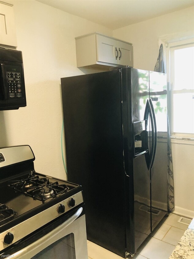 Building Photo - 4 br, 2 bath House - 117 Armstrong Dr
