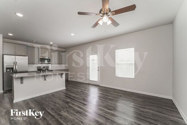 Foto del edificio - 10714 Rivergate Dr NW