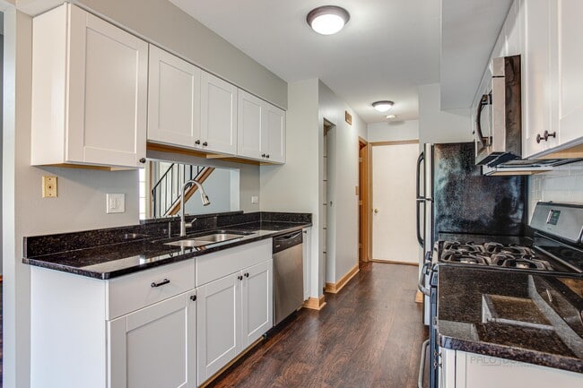 kitchen with pass-through - 240 Acorn Dr
