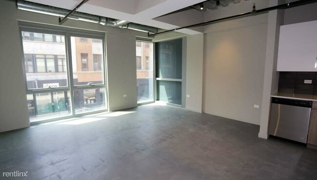 Building Photo - 1241 N Milwaukee Ave