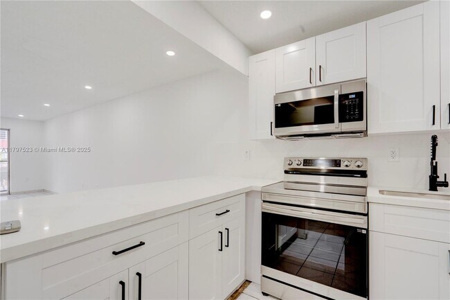 Building Photo - 6095 W 19th Ave