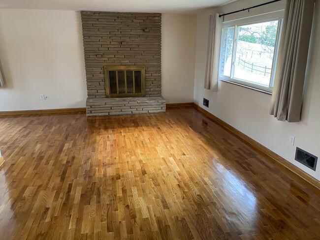 Living room with firewood - 1018 Rainbow Rd