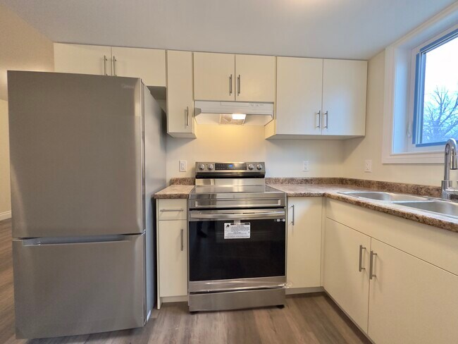 Photo du bâtiment - Brand New 2-Bedroom Townhome – Available I...