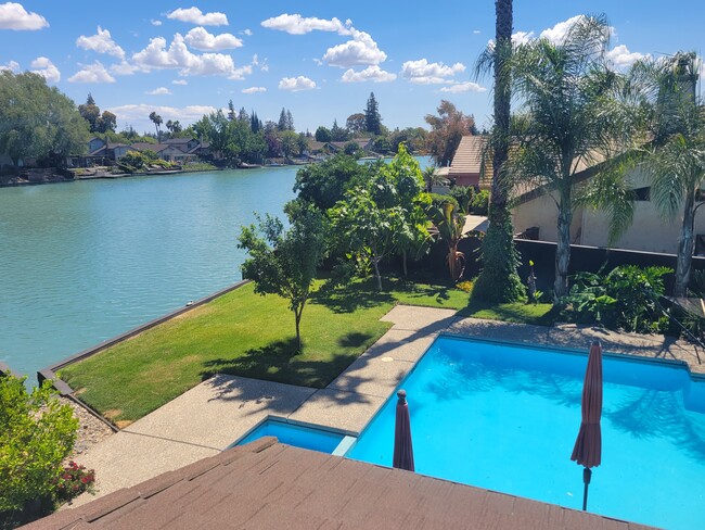 View of lake from Bedroom 1 - 5247 Grouse Run Dr