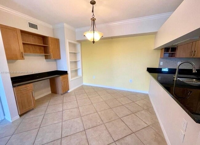 Foto del edificio - 6418 Emerald Dunes Dr