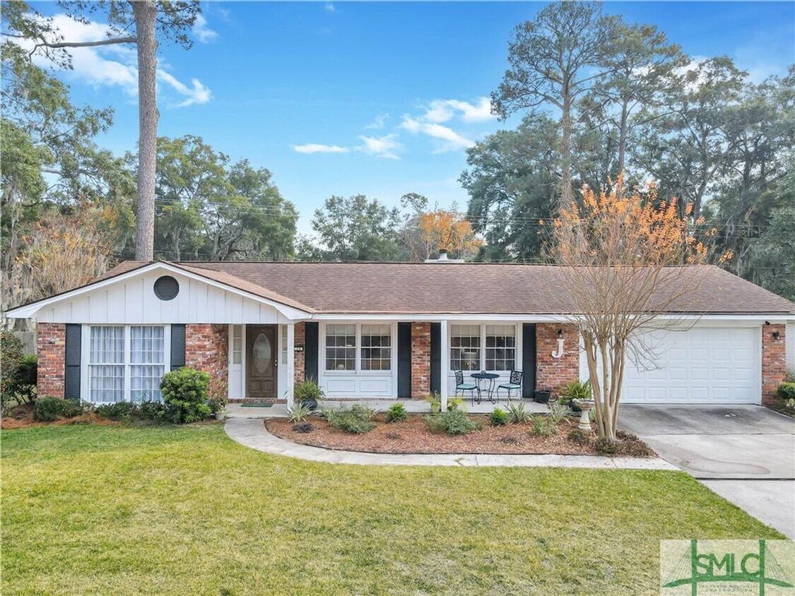 Primary Photo - 4 bedroom, 3 bathroom Brick Ranch home loc...