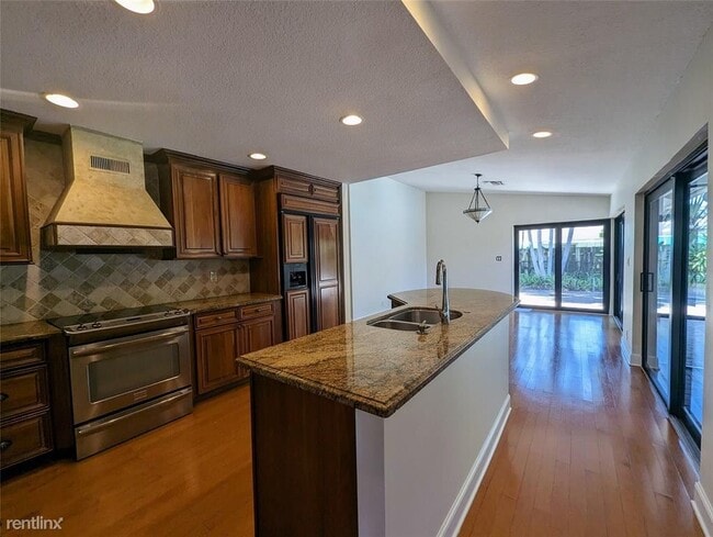 Building Photo - 4 br, 2 bath House - 5551 Marbella Dr