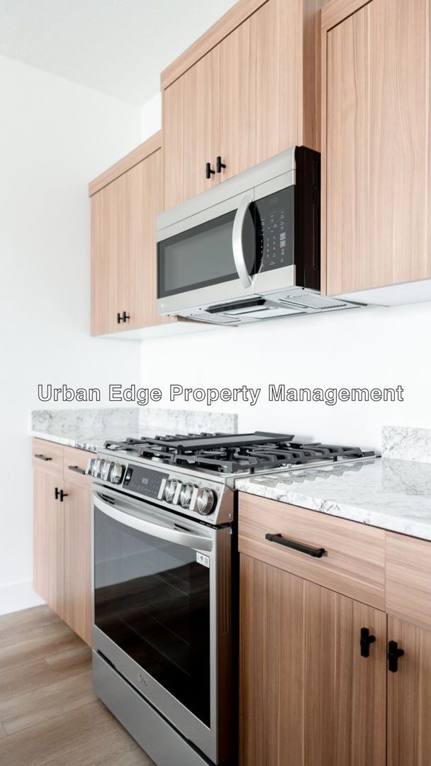 Building Photo - Move in special for July / NEW Row Home wi...