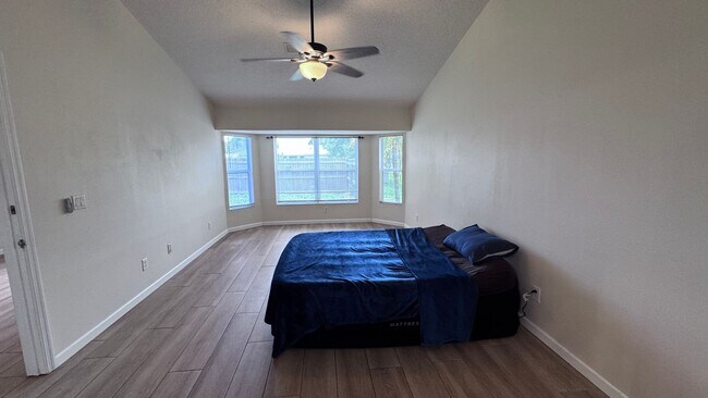 Building Photo - Spacious 4-Bedroom Home in NW Palm Bay – A...