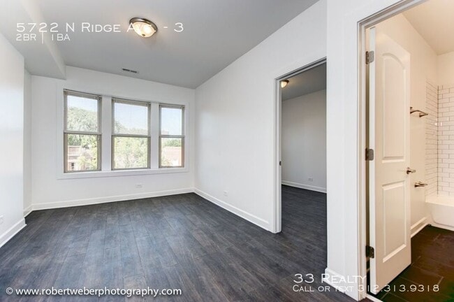 Building Photo - 5722 N Ridge Ave