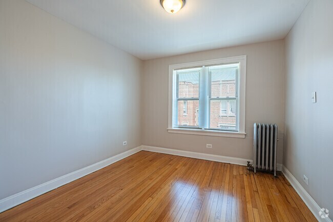 3 habitaciones, 1 baño - 1080 pies cuadrados - Dormitorio principal - 7526-36 S Colfax Ave