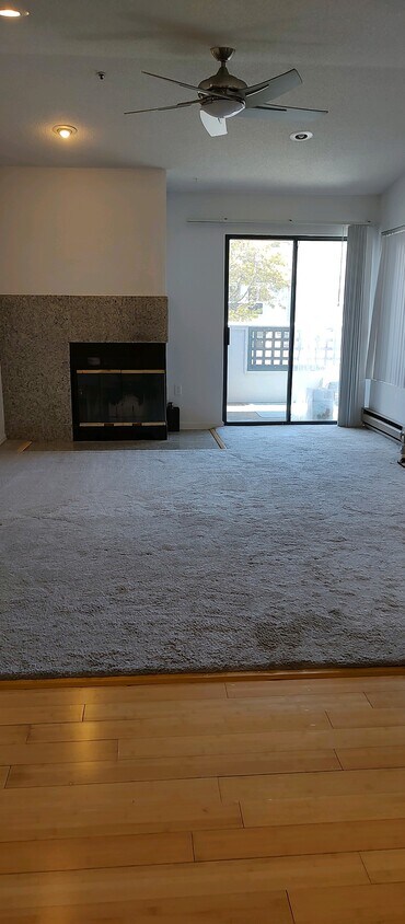 Living room with fire place - 1201 Glen Cove Pky